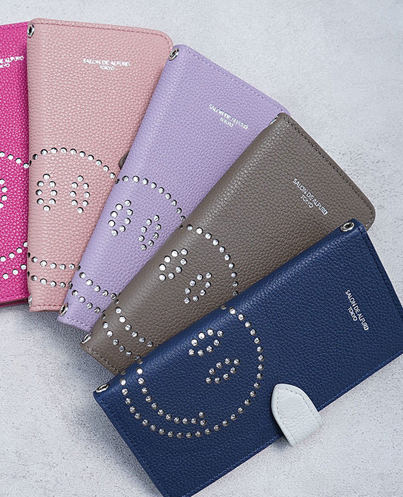 スマイル パンチング 多機種対応 手帳型スマホケース スペインカーフVer. 1665-sc