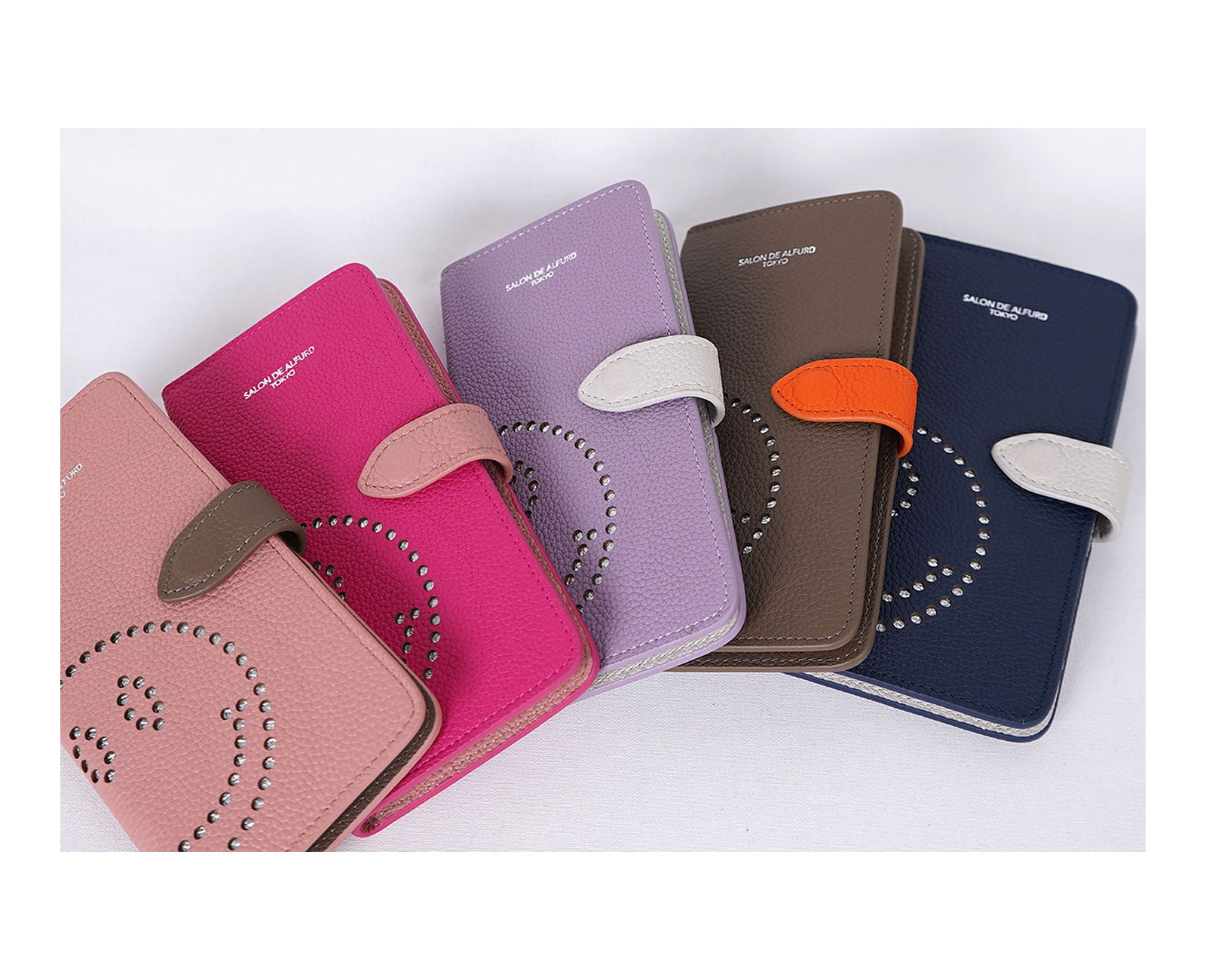 スマイル パンチング 多機種対応 手帳型スマホケース スペインカーフVer. 1665-sc