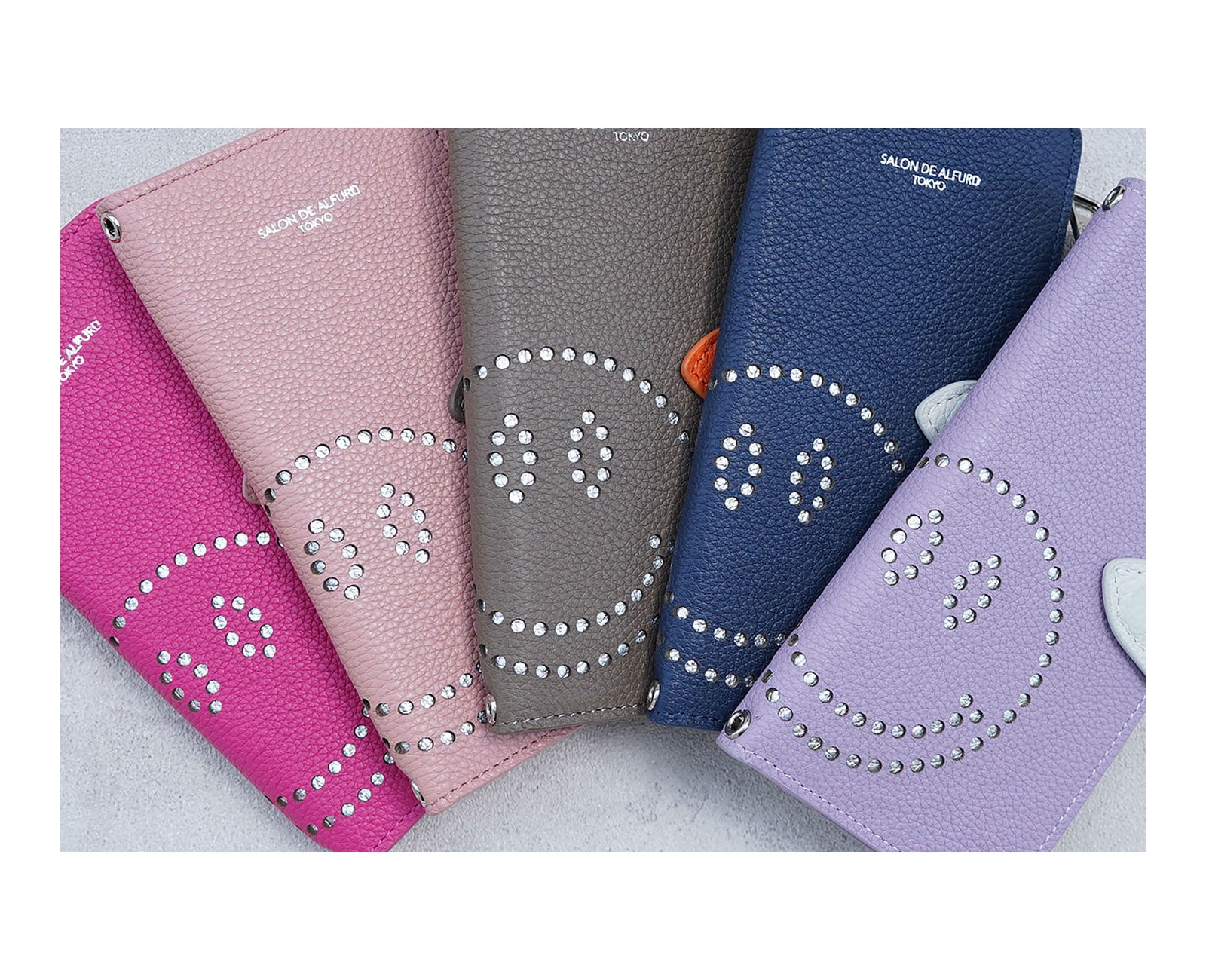 スマイル パンチング 多機種対応 手帳型スマホケース スペインカーフVer. 1665-sc