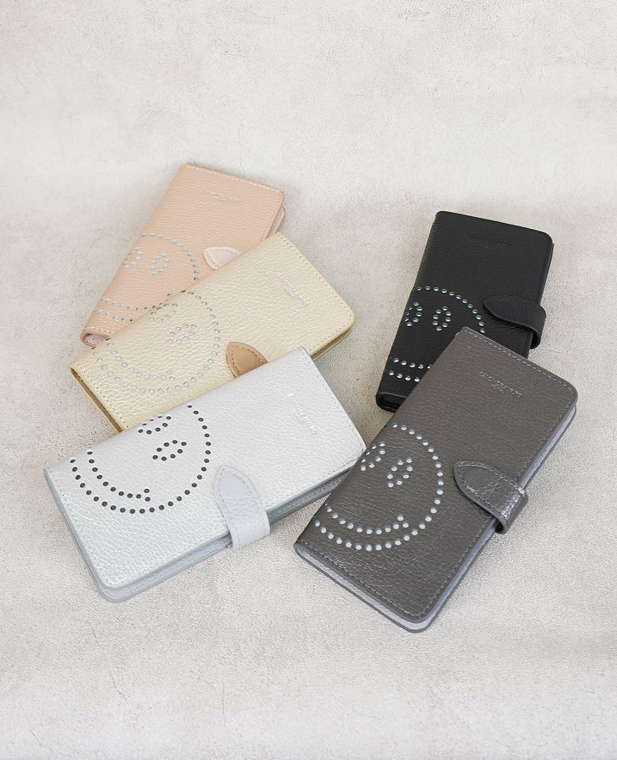 スマイル パンチング 多機種対応 手帳型スマホケース 1665