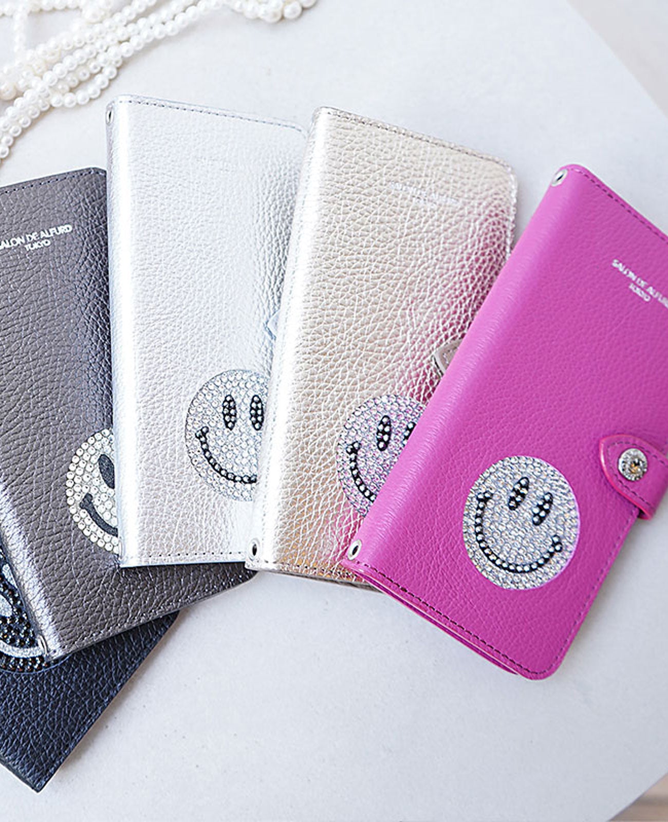 スマイル 多機種対応 手帳型スマホケース 1683