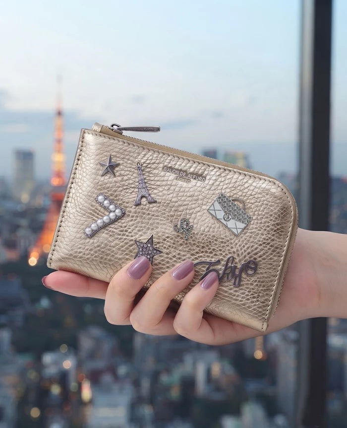 サロンドアルファード 東京広尾発アイコニックなスマイルマークの