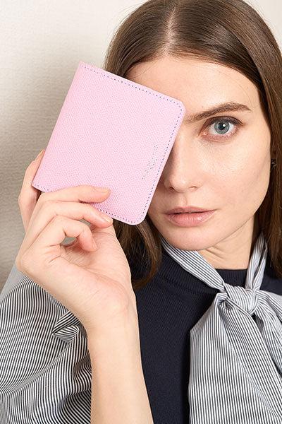 サロンドアルファード 東京広尾発アイコニックなスマイルマークの