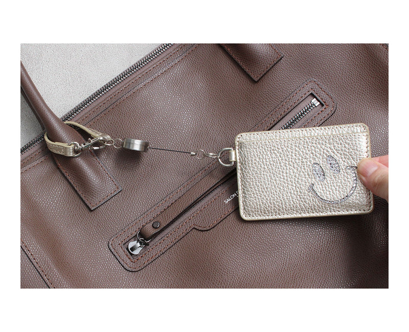 1658-02 [OUTLET]  スマイル リール付きパスケース